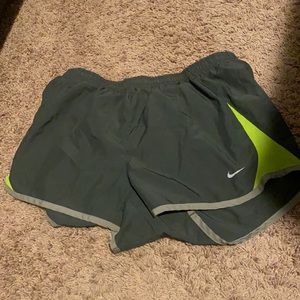 Grey and green Nike shorts